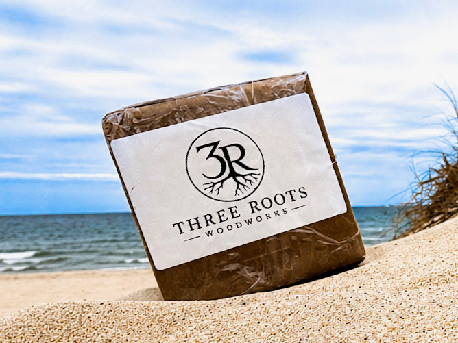 Three Roots Woodworks package on the beach
